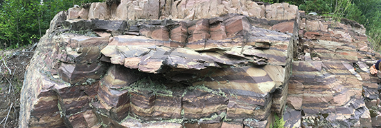 The Gordon Lake Formation is made up of tan colored laminated sandstones, purple and green colored siltstones, and chert. These sediments were deposited in a tidal flat type of environment, before the formation of Sudbury Crater, about 2.3 billion years ago.