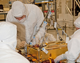 SAM Team loading the component into Curiosity